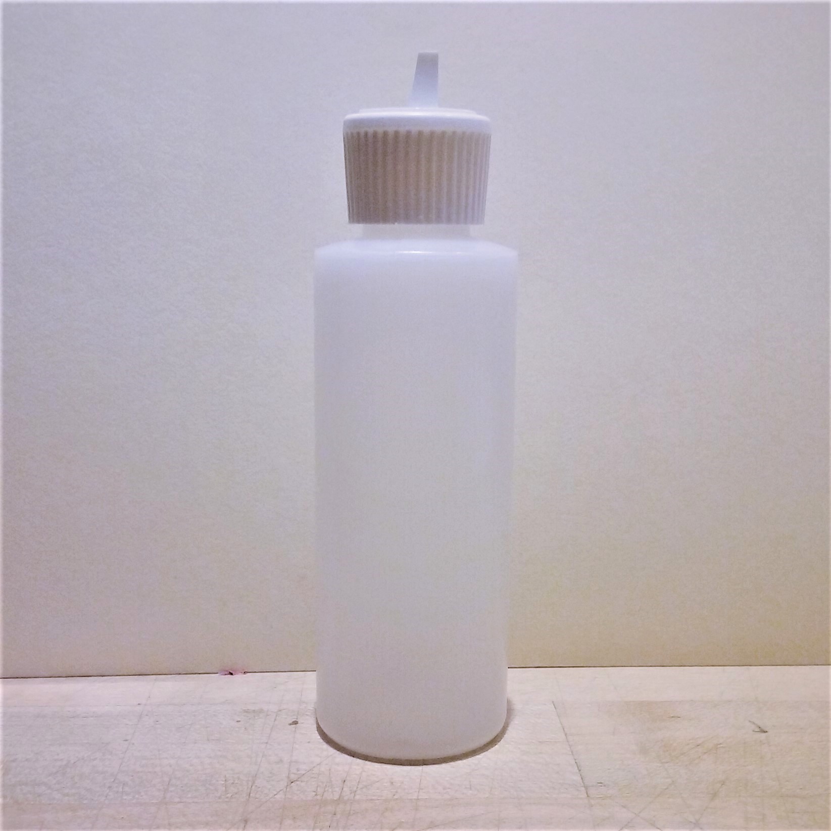 4 oz Plastic Cylindrical Bottle with White Flip Top