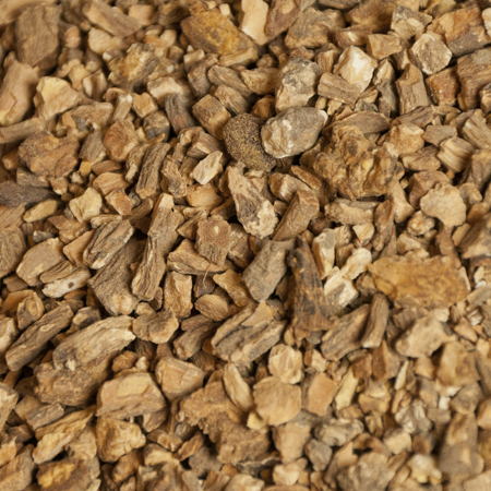 Close-up of certified organic roasted dandelion root (Taraxacum officinale), offering a flavorful coffee alternative with a hint of sweetness.