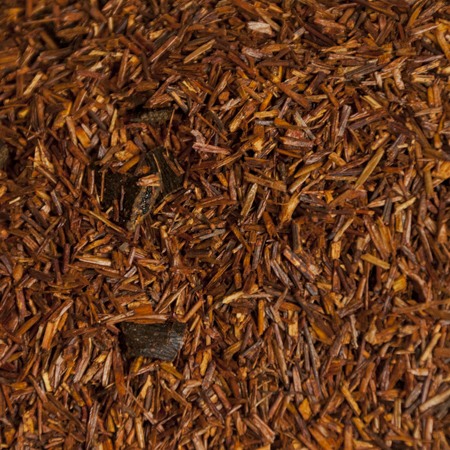 Close-up of organic Vanilla Rooibos Tea blend, showcasing the smooth and aromatic vanilla-infused Rooibos leaves.