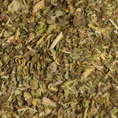 Close-up of Ease the Blues Tea blend, the best tea for depression, featuring organic and wild-harvested herbs like St John's Wort and Lemon Balm.