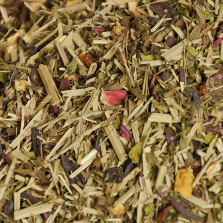 Close-up of organic dried hibiscus, lemongrass, spearmint, and rosehips used in our Hibiscus Lemongrass Tea blend.